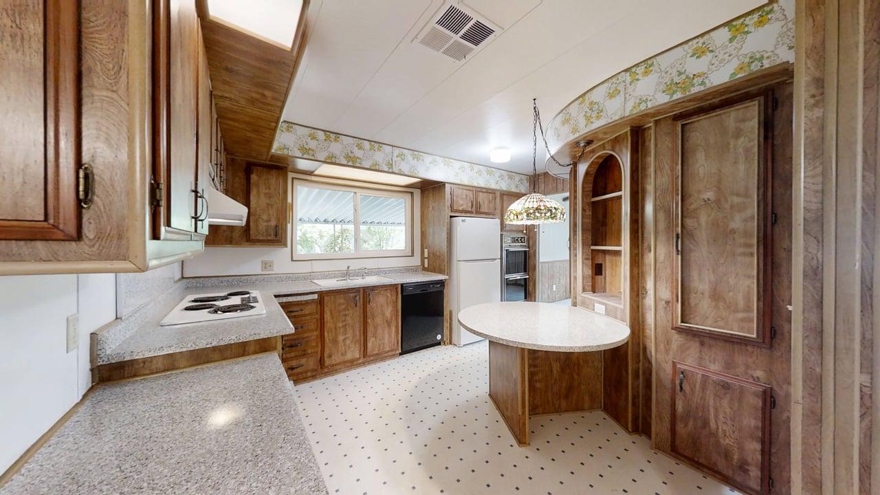 156 Rimma Way Roseville, CA 95661 - Photo 7 of 24 a hallway with furniture and window