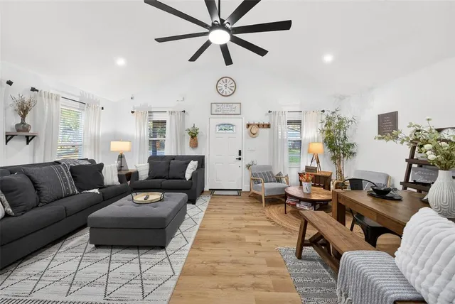 a living room with furniture and a window