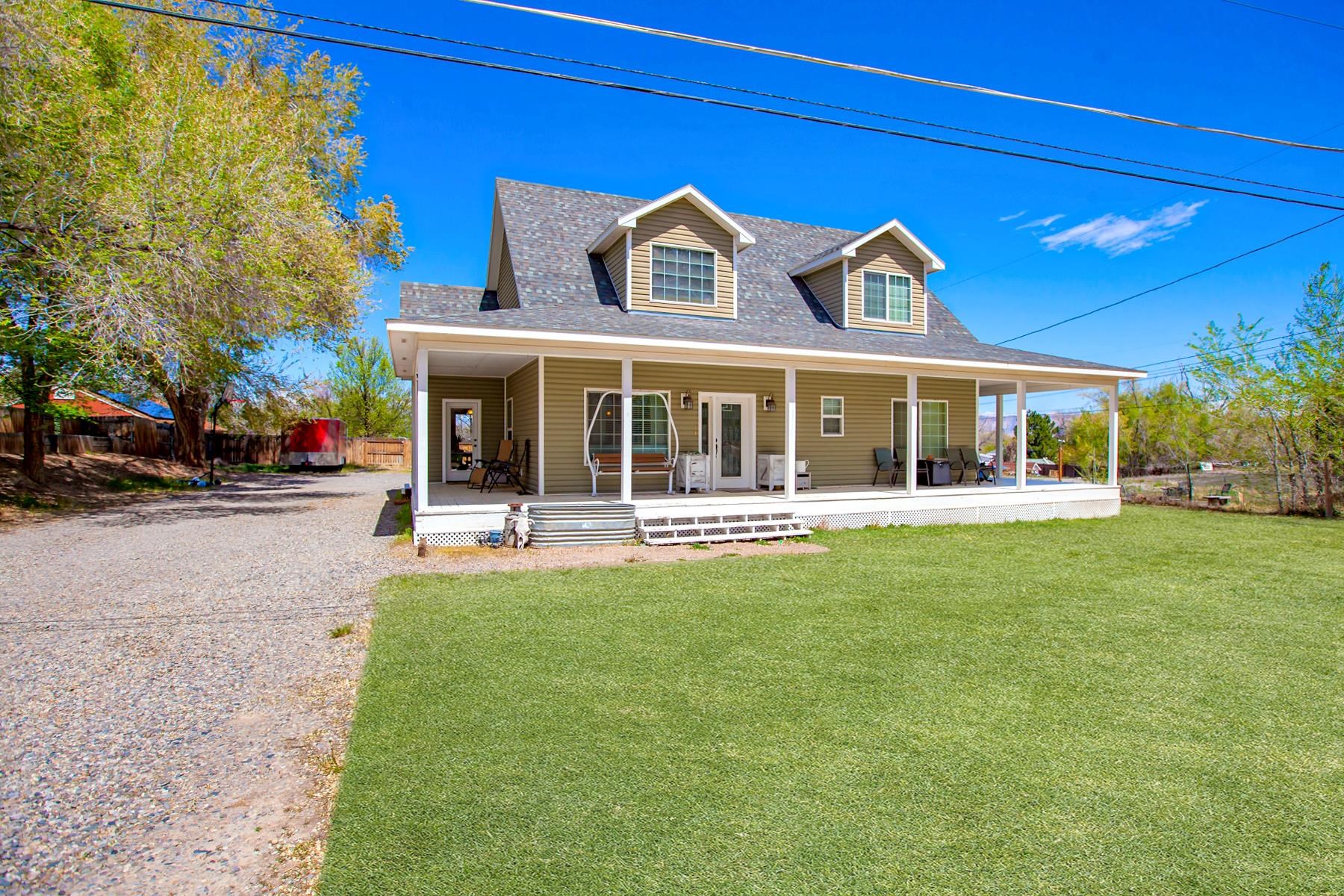 2314 Broadway Grand Junction, CO 81507 - Photo 1 of 39 front view of a brick house with a swimming pool