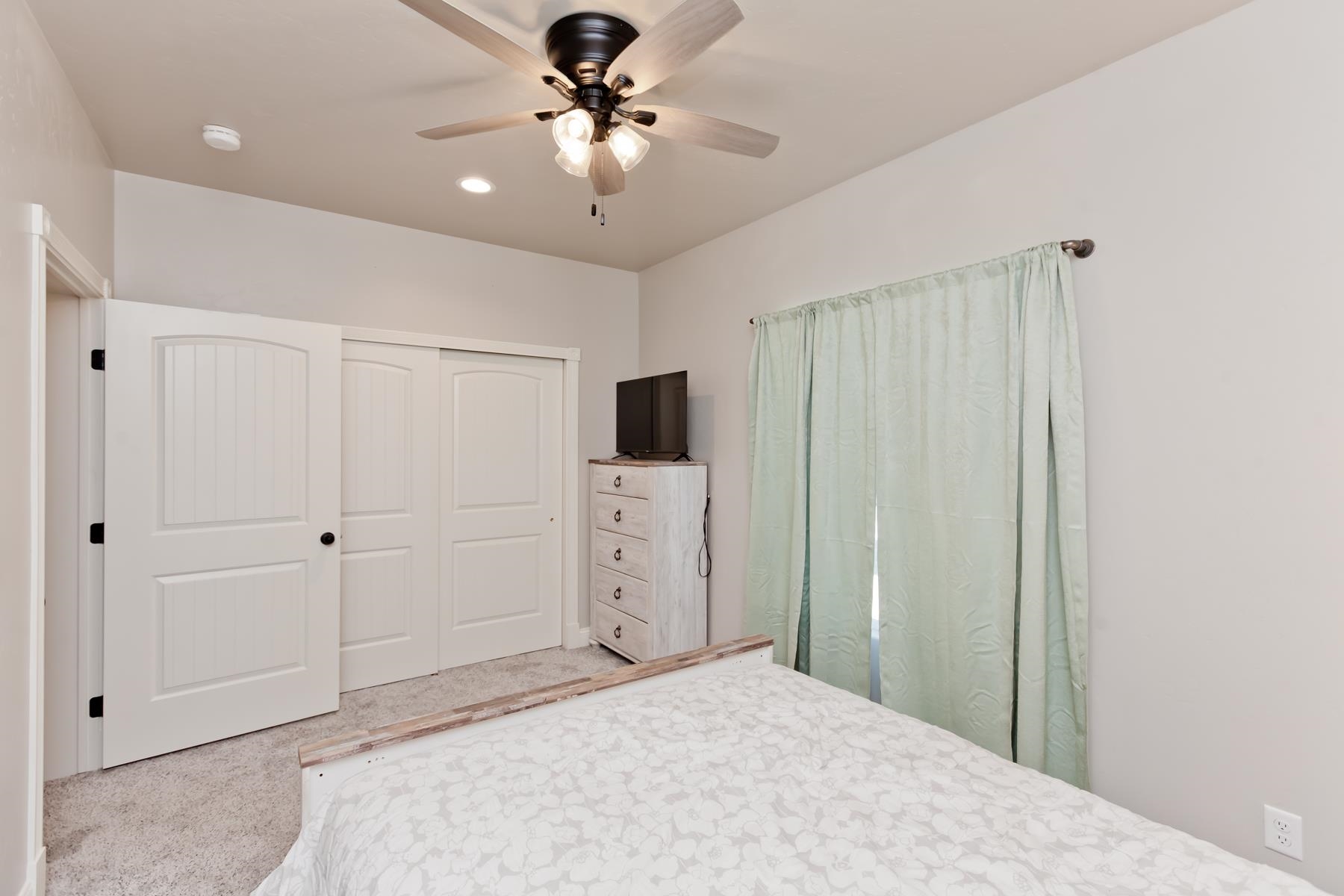 2314 Broadway Grand Junction, CO 81507 - Photo 15 of 39 a view of a livingroom with a chandelier fan and closet area