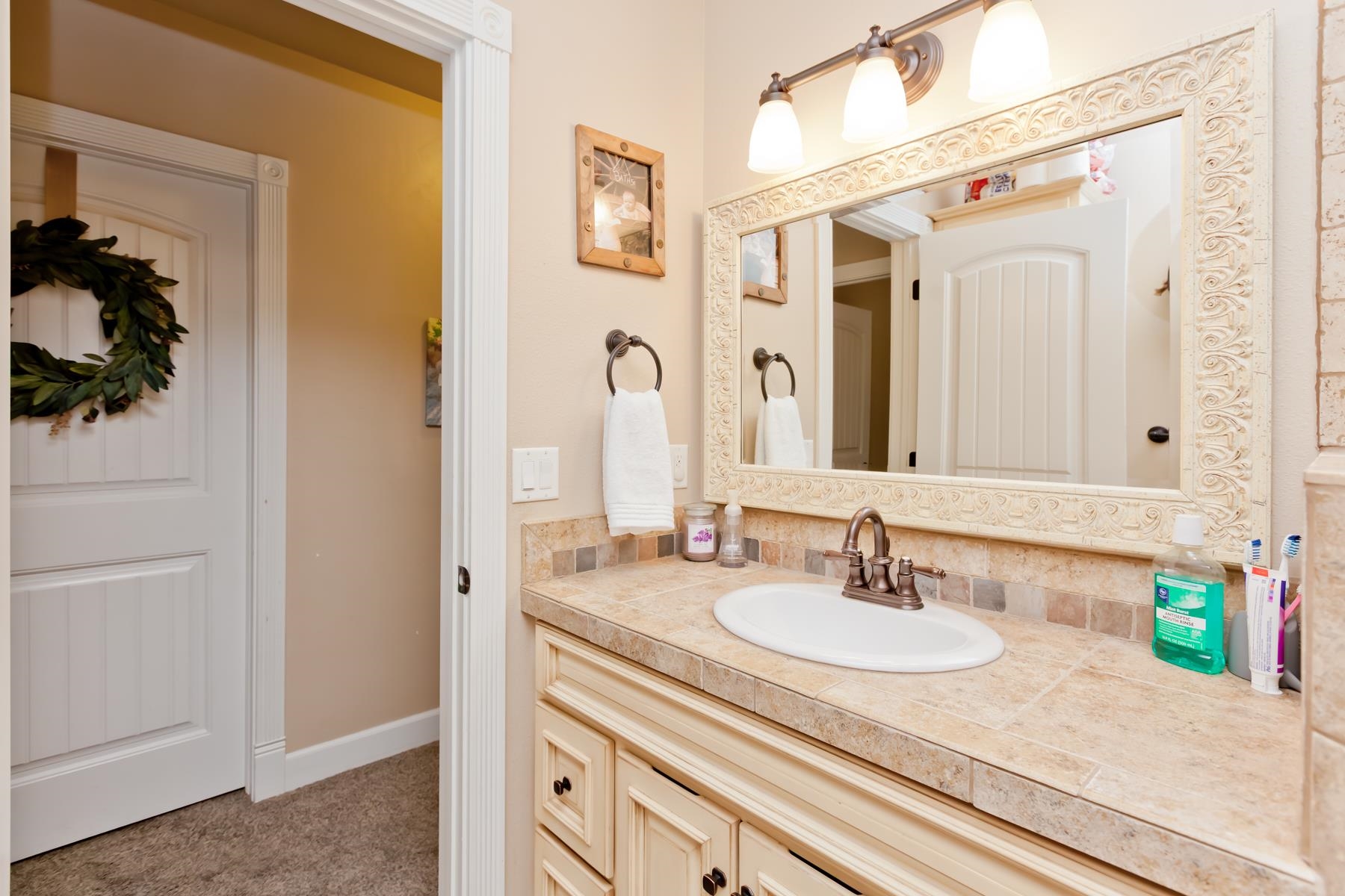 2314 Broadway Grand Junction, CO 81507 - Photo 17 of 39 a bathroom with a sink and a mirror