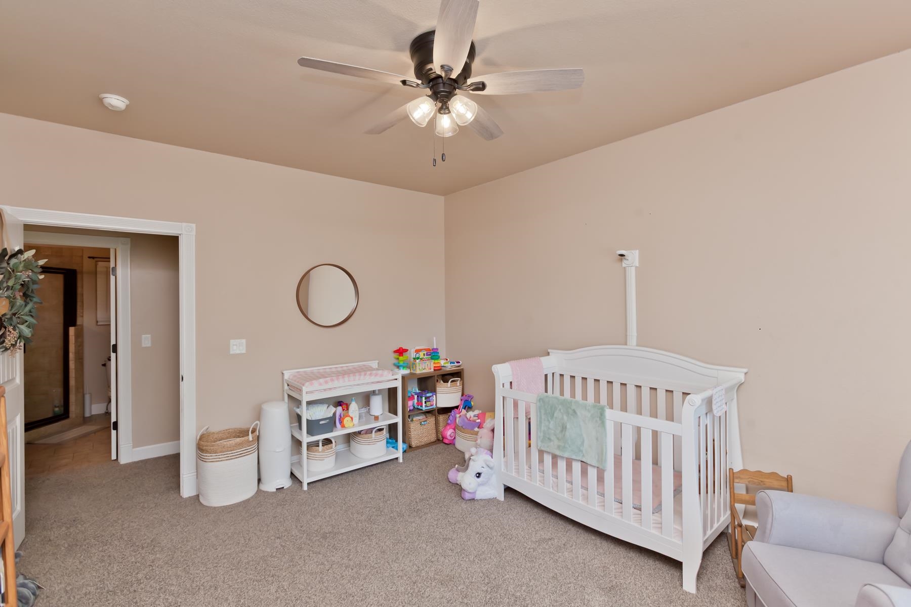 2314 Broadway Grand Junction, CO 81507 - Photo 21 of 39 a bedroom with furniture and a chandelier