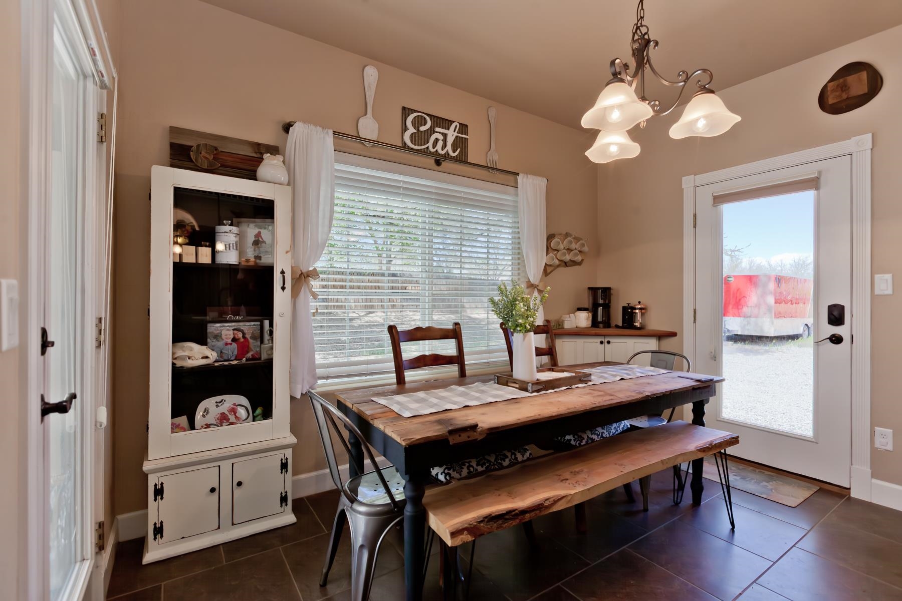 2314 Broadway Grand Junction, CO 81507 - Photo 5 of 39 a view of a dining room with furniture and chandelier
