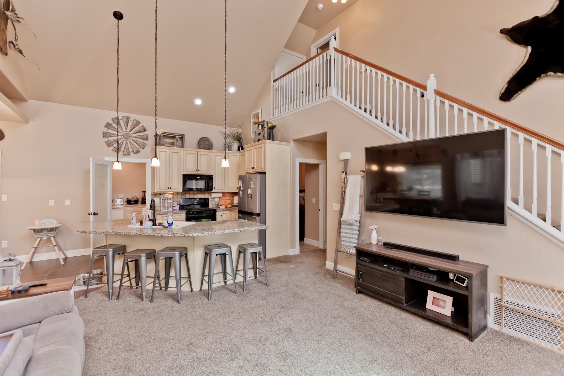 2314 Broadway Grand Junction, CO 81507 - Photo 6 of 39 a living room with furniture and a flat screen tv