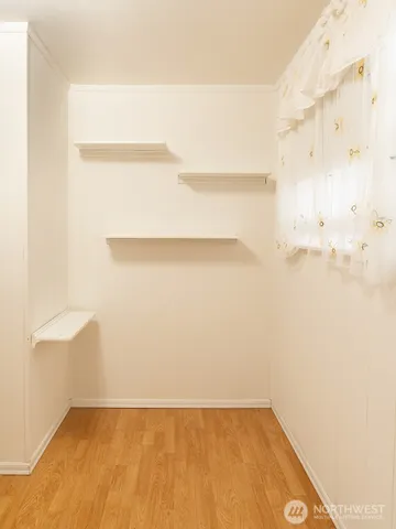 a bathroom with a shower and a bath tub
