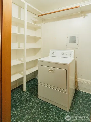 a view of a room with shelves