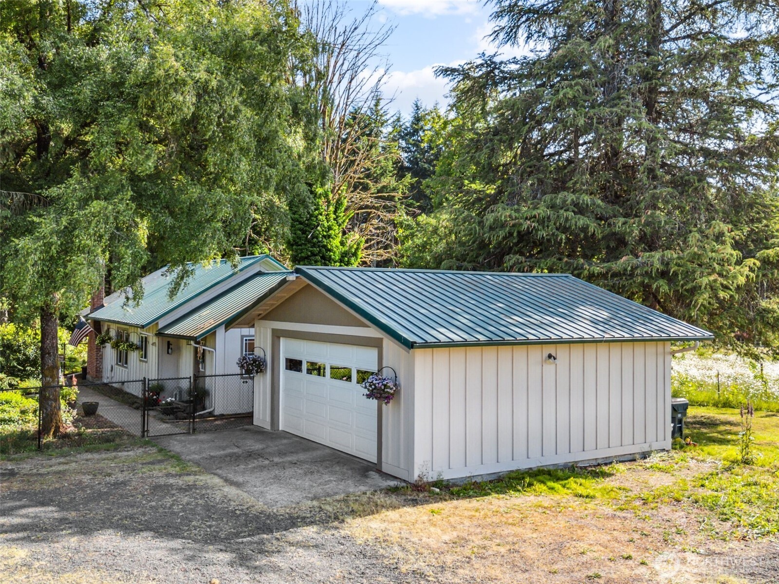 3381 Centralia Alpha Road Onalaska, WA 98570 - Photo 20 of 30 a front view of a house with a yard and garage