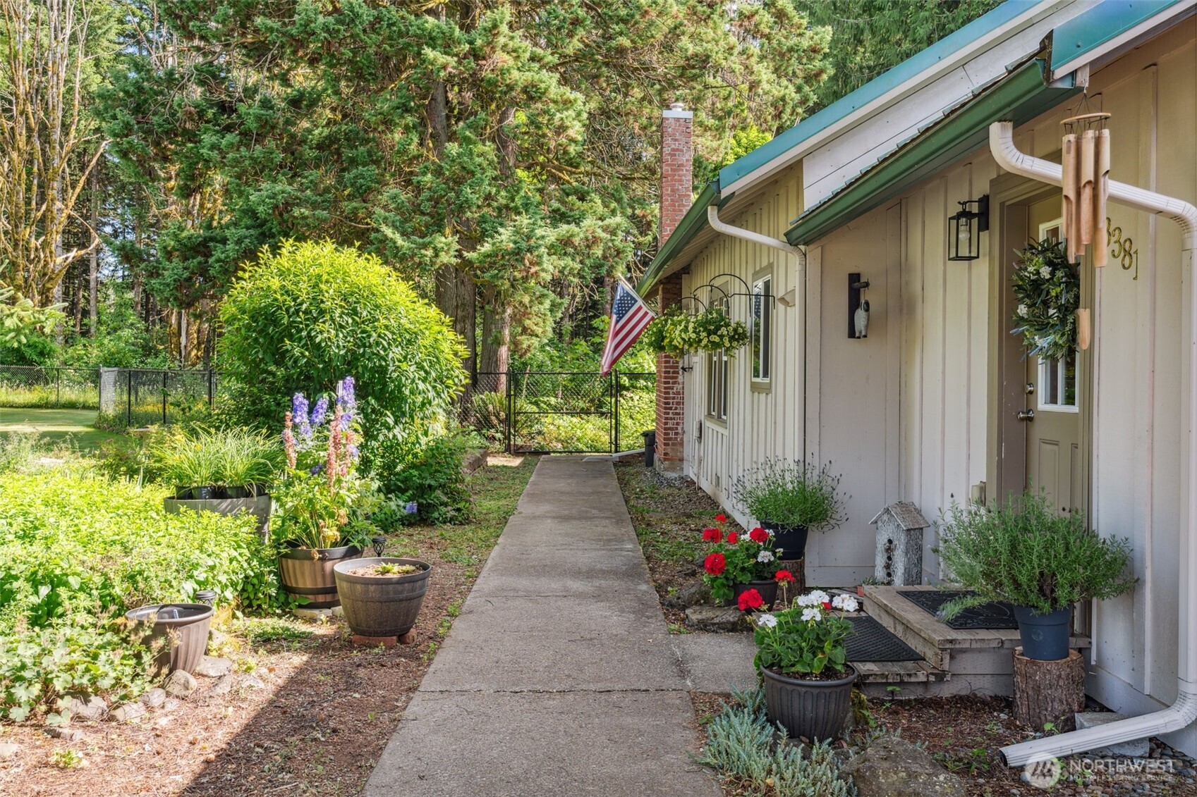 3381 Centralia Alpha Road Onalaska, WA 98570 - Photo 2 of 30 a front view of a house with a porch