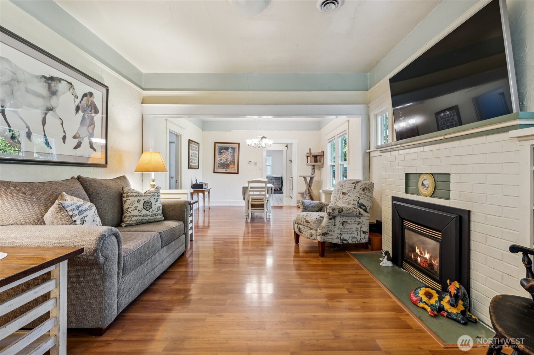3381 Centralia Alpha Road Onalaska, WA 98570 - Photo 5 of 30 a living room with furniture and a fireplace or television