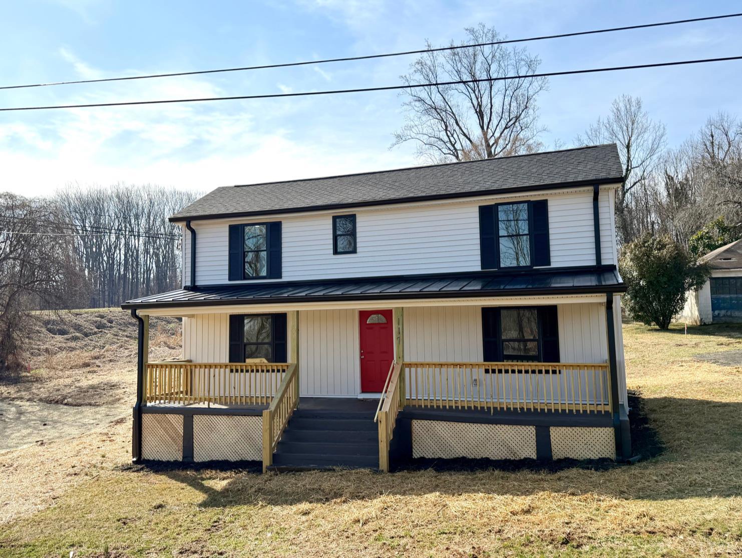 117 Monroe Street Monroe, VA 24574 - Photo 2 of 37 a view of a house with a wooden fence