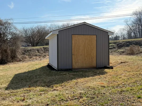 a view of a house with a garage