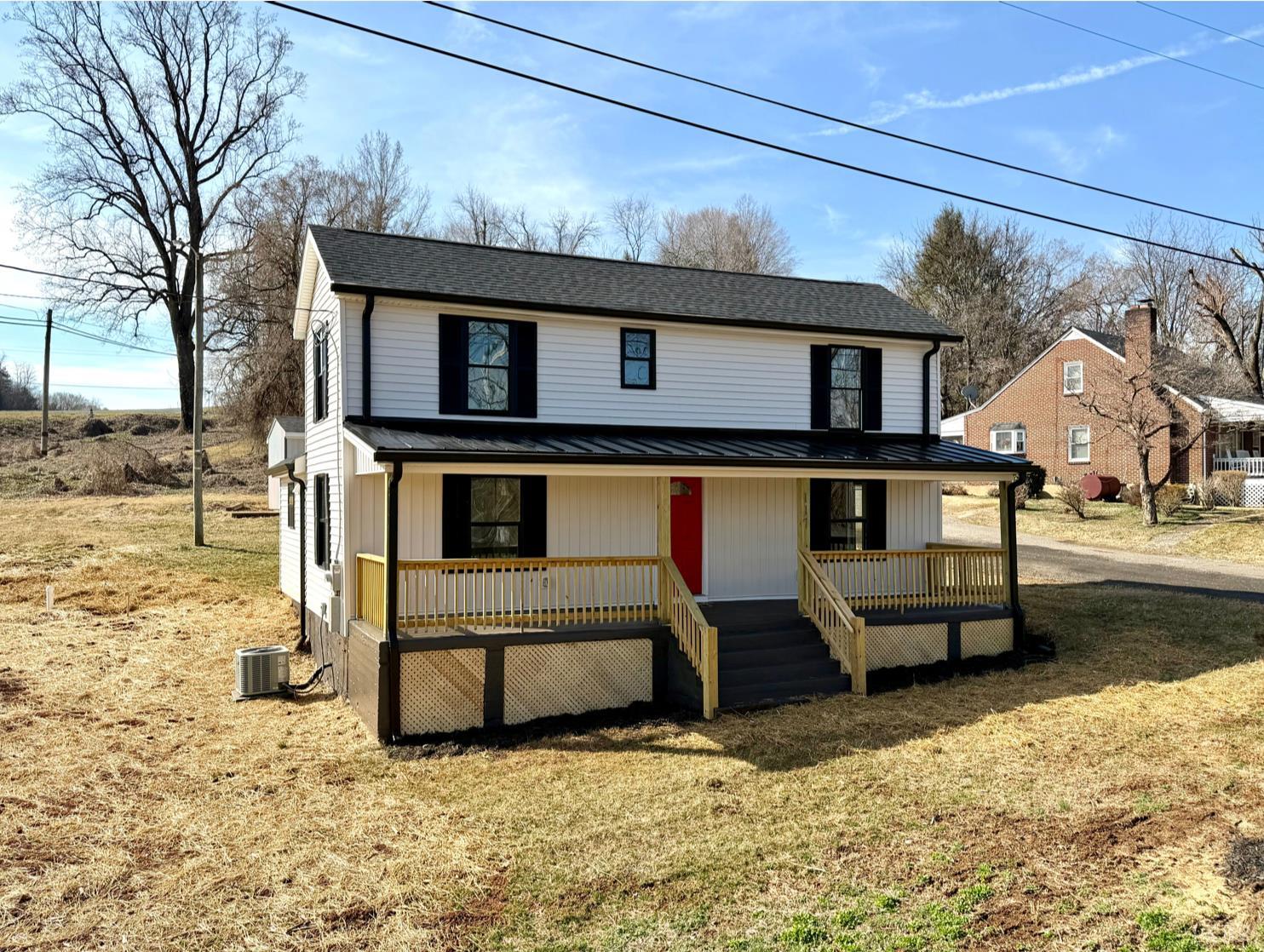 117 Monroe Street Monroe, VA 24574 - Photo 3 of 37 a front view of a house with a yard
