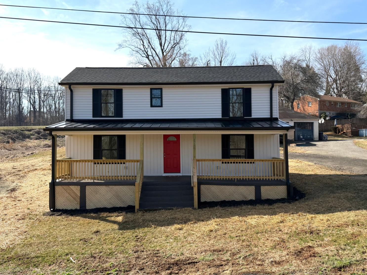 117 Monroe Street Monroe, VA 24574 - Photo 34 of 37 a front view of a house with a yard