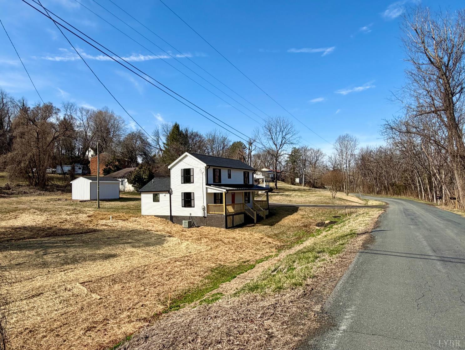 117 Monroe Street Monroe, VA 24574 - Photo 36 of 37 a view of a house with snow on the road