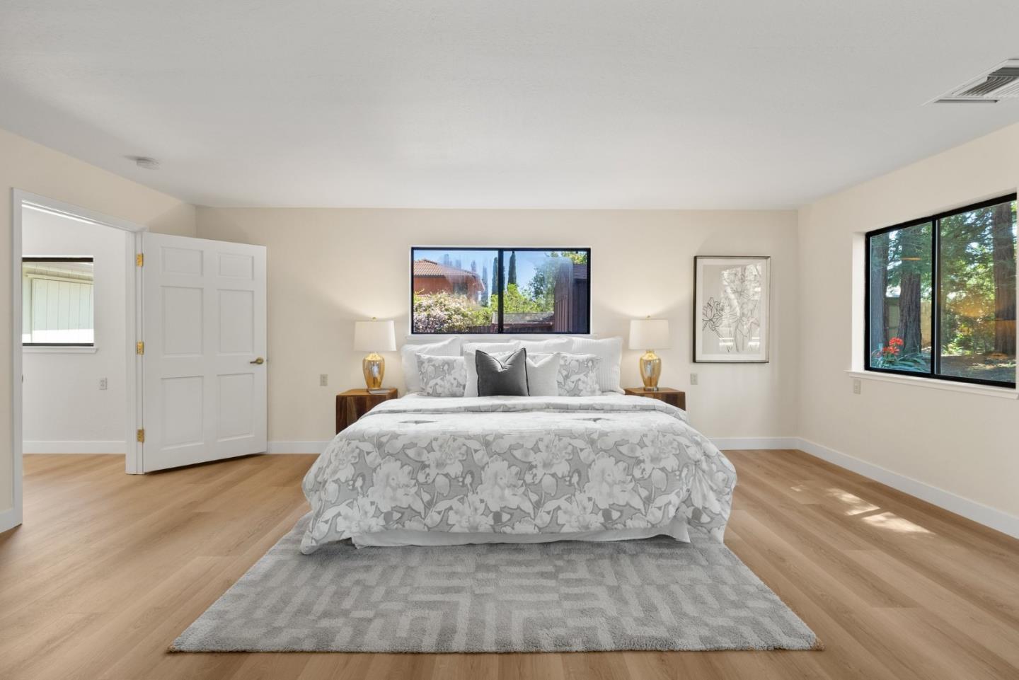 20540 Leonard Road Saratoga, CA 95070 - Photo 19 of 49 a spacious bedroom with a bed and window