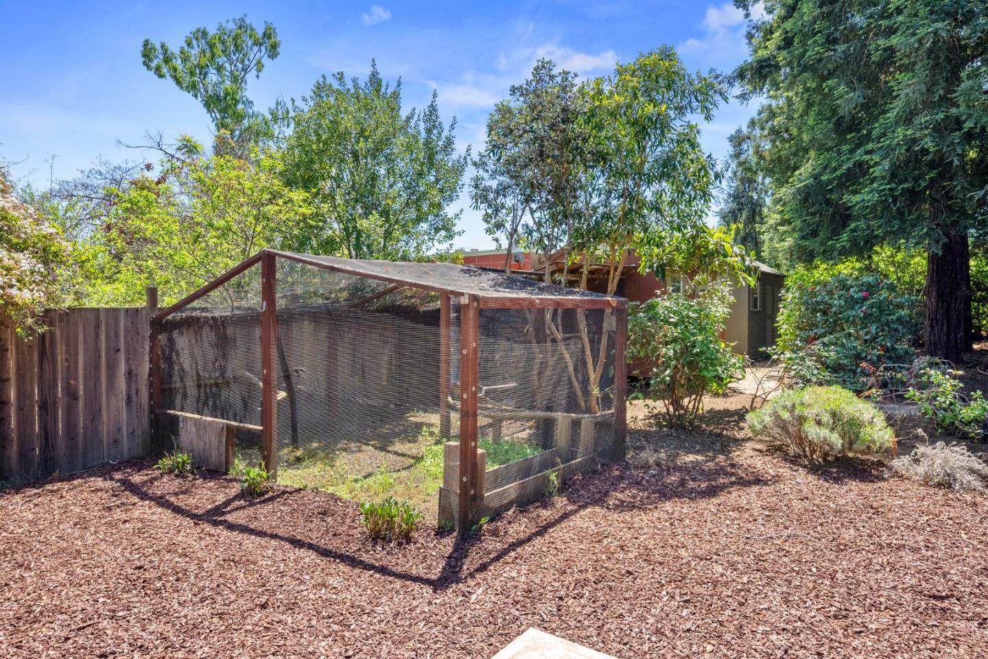 20540 Leonard Road Saratoga, CA 95070 - Photo 42 of 49 a backyard of a house with lots of green space