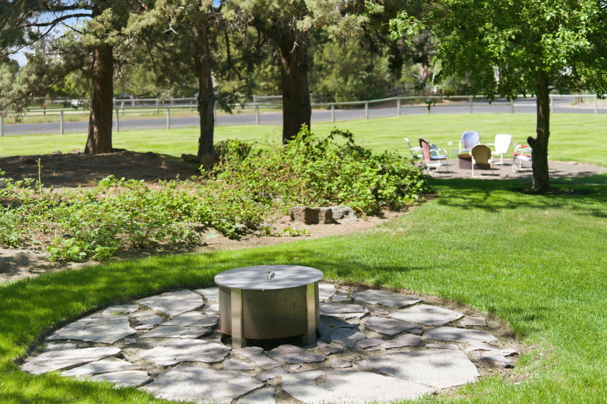 22539 Martee Lane Bend, OR 97701 - Photo 40 of 54 a view of a garden with a fountain