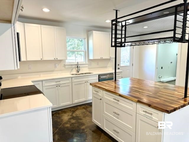 403 East 4th Street Bay Minette, AL 36507 - Photo 10 of 19 Kitchen featuring granite counter tops counters and white cabinetry