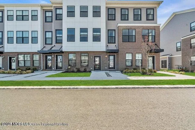 a view of building with a yard