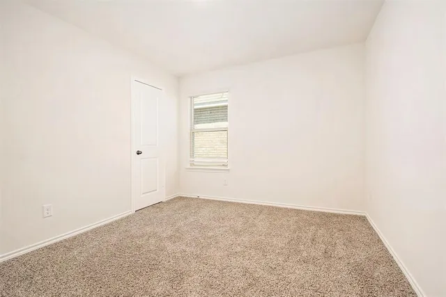 an empty room with a natural light