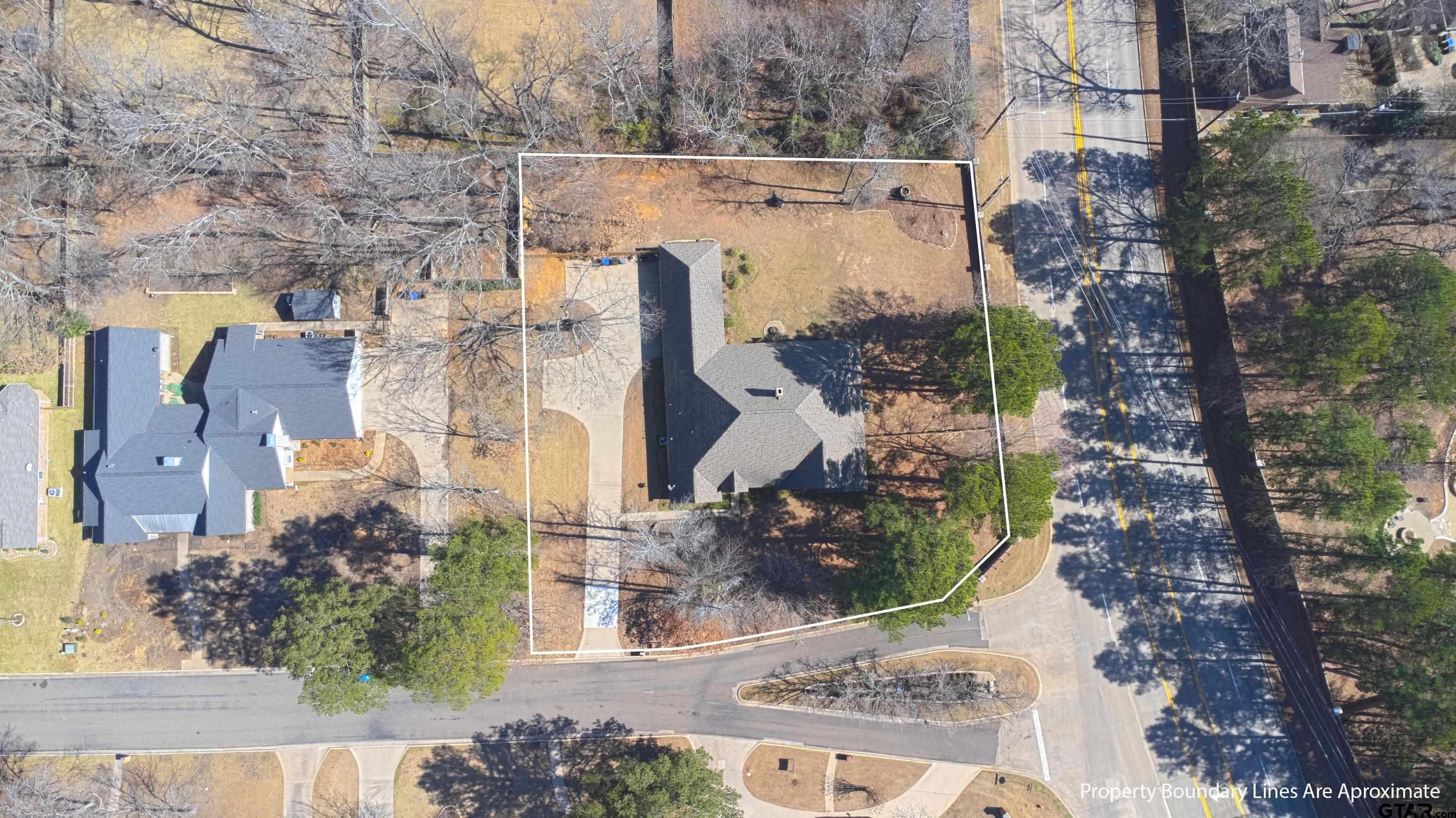3800 Holly Ridge Drive Longview, TX 75605 - Photo 33 of 38 aerial view of multiple house