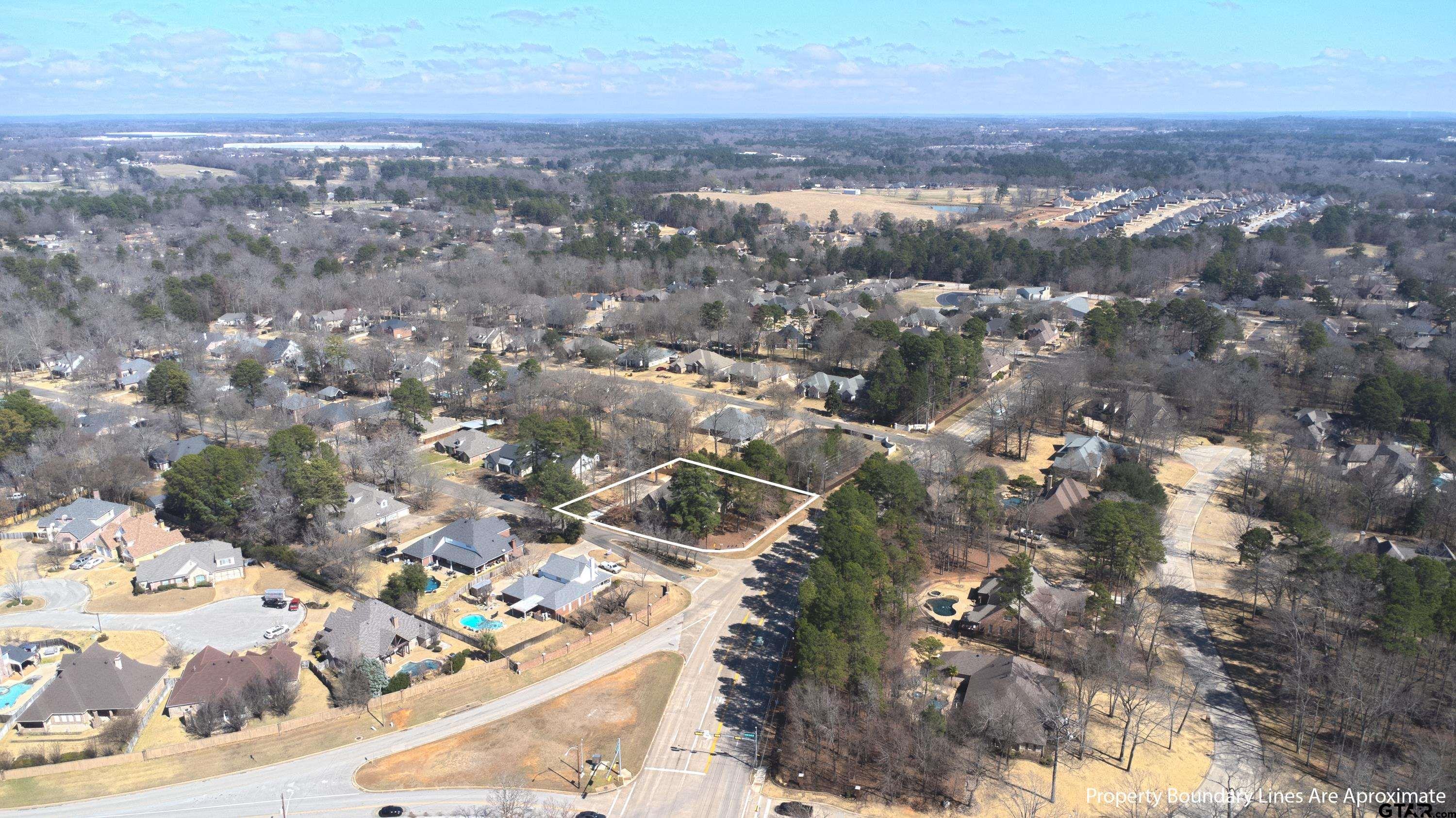 3800 Holly Ridge Drive Longview, TX 75605 - Photo 35 of 38 an aerial view of residential houses with outdoor space