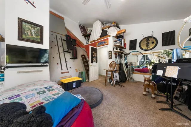 a view of a livingroom with furniture and a fireplace