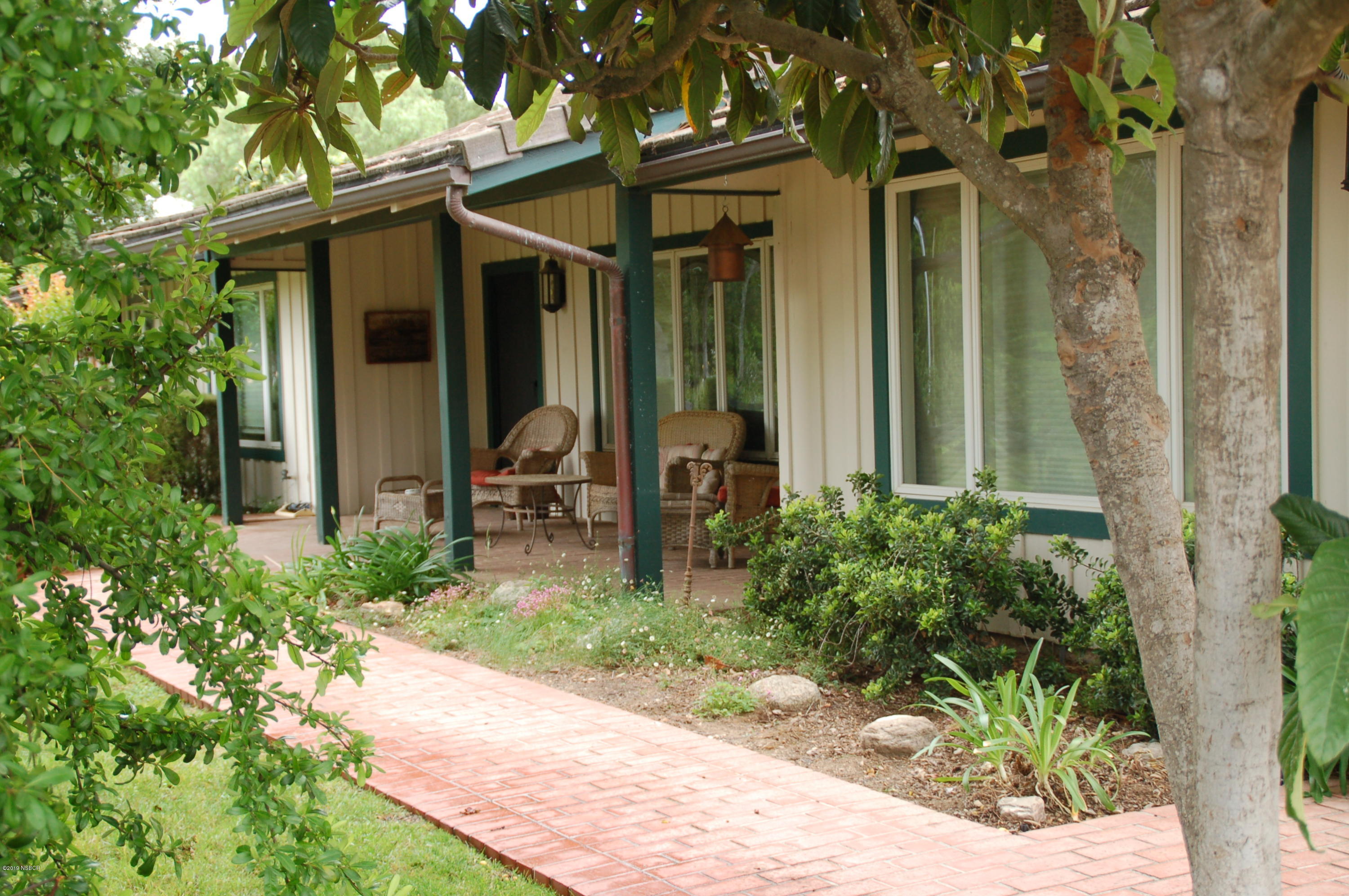 724 North Refugio Road Santa Ynez, CA 93460 - Photo 1 of 25 a view of a back yard of the house