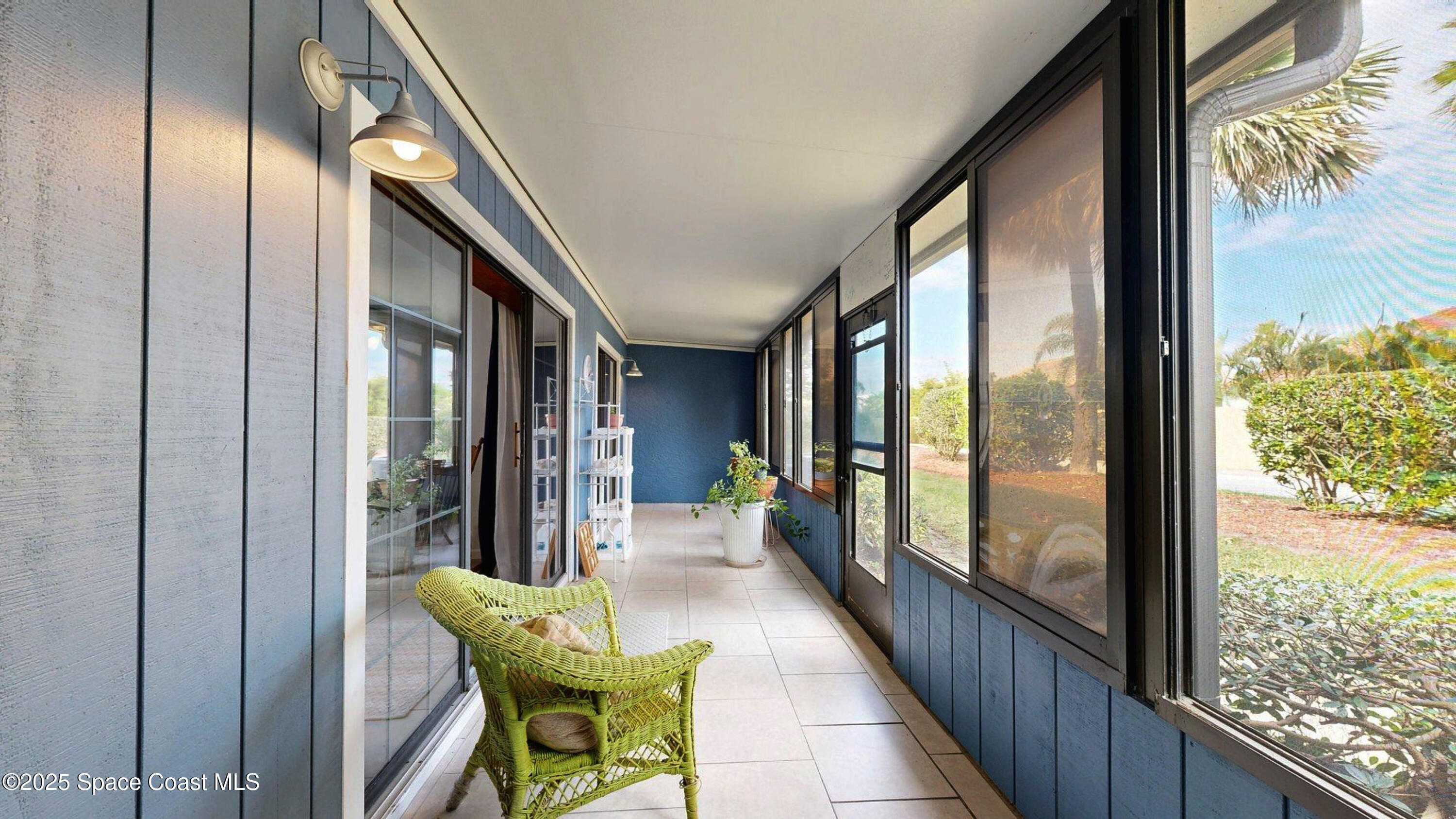 101 La Costa Street, Unit 6B Melbourne, FL 32951 - Photo 12 of 24 a view of an chairs and table in the balcony