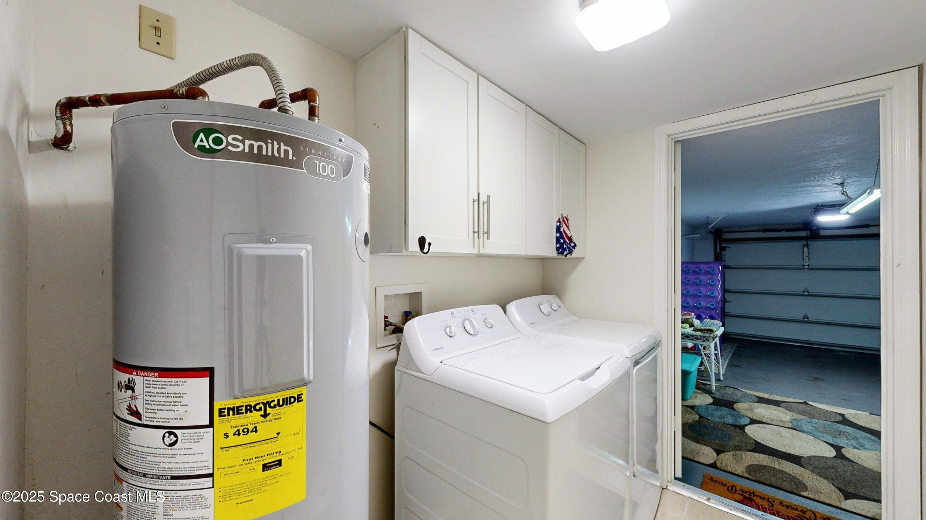 101 La Costa Street, Unit 6B Melbourne, FL 32951 - Photo 13 of 24 a utility room with dryer and washer