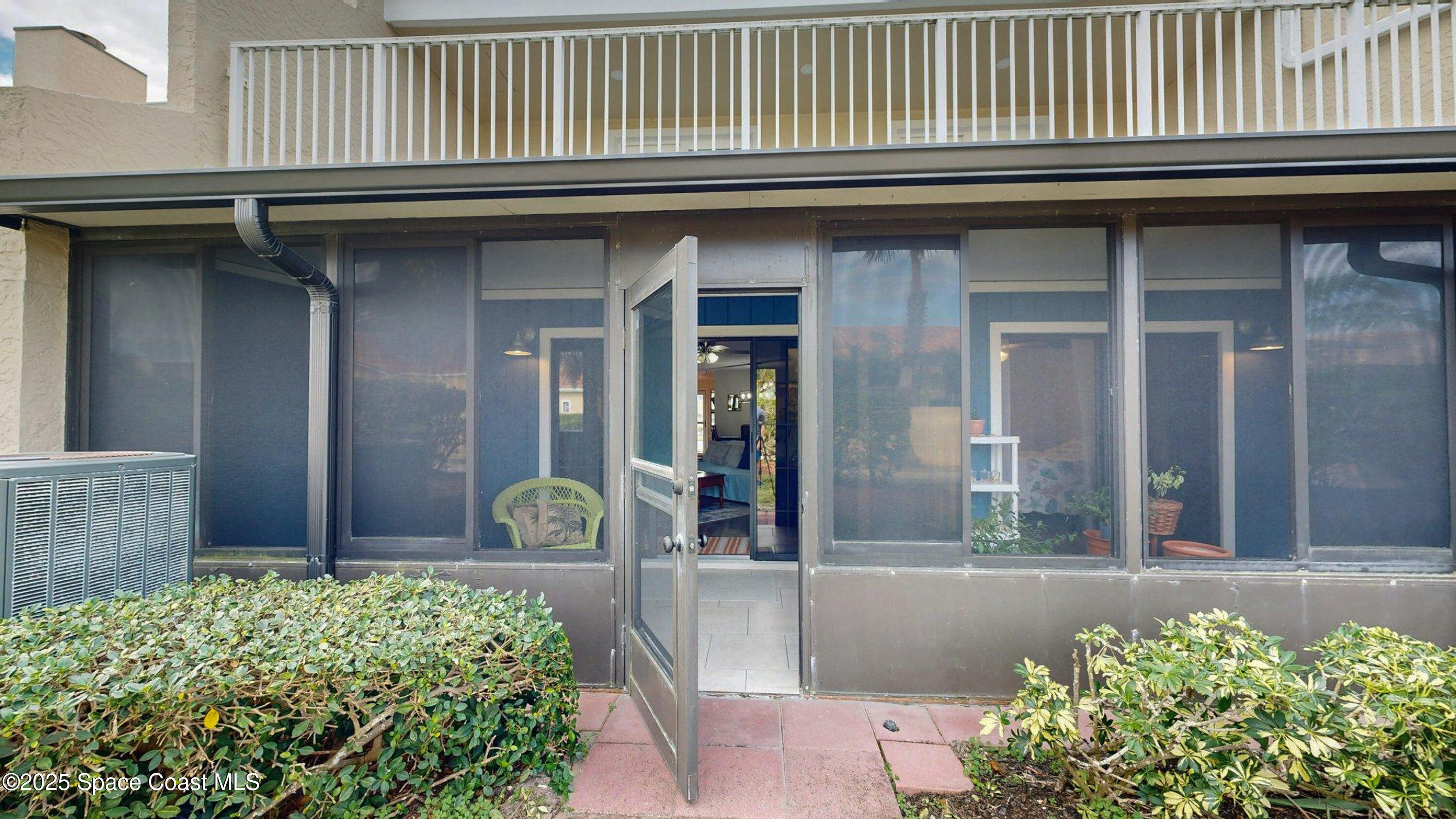 101 La Costa Street, Unit 6B Melbourne, FL 32951 - Photo 14 of 24 a front view of a house