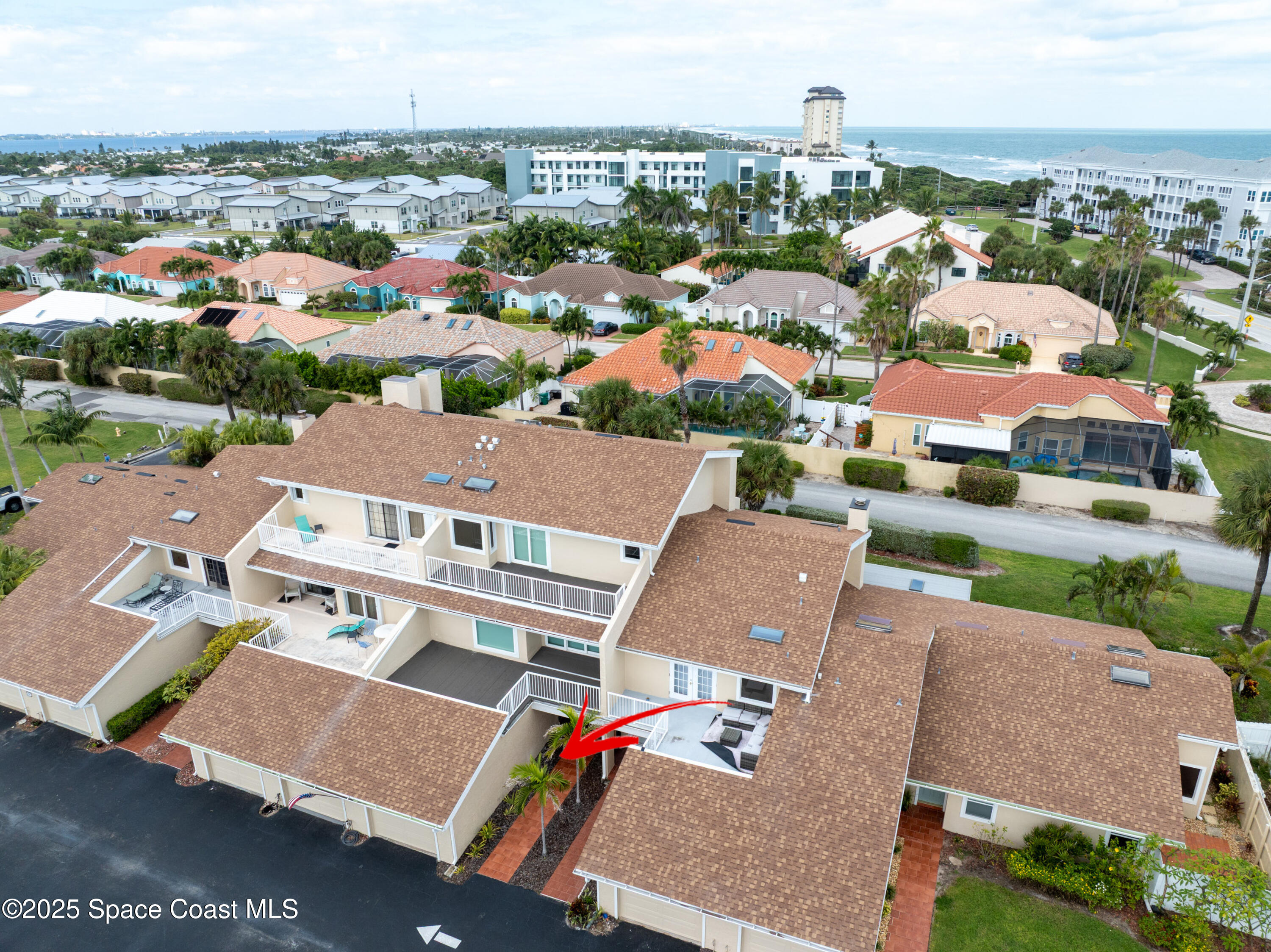 101 La Costa Street, Unit 6B Melbourne, FL 32951 - Photo 15 of 24 an aerial view of residential houses with outdoor space