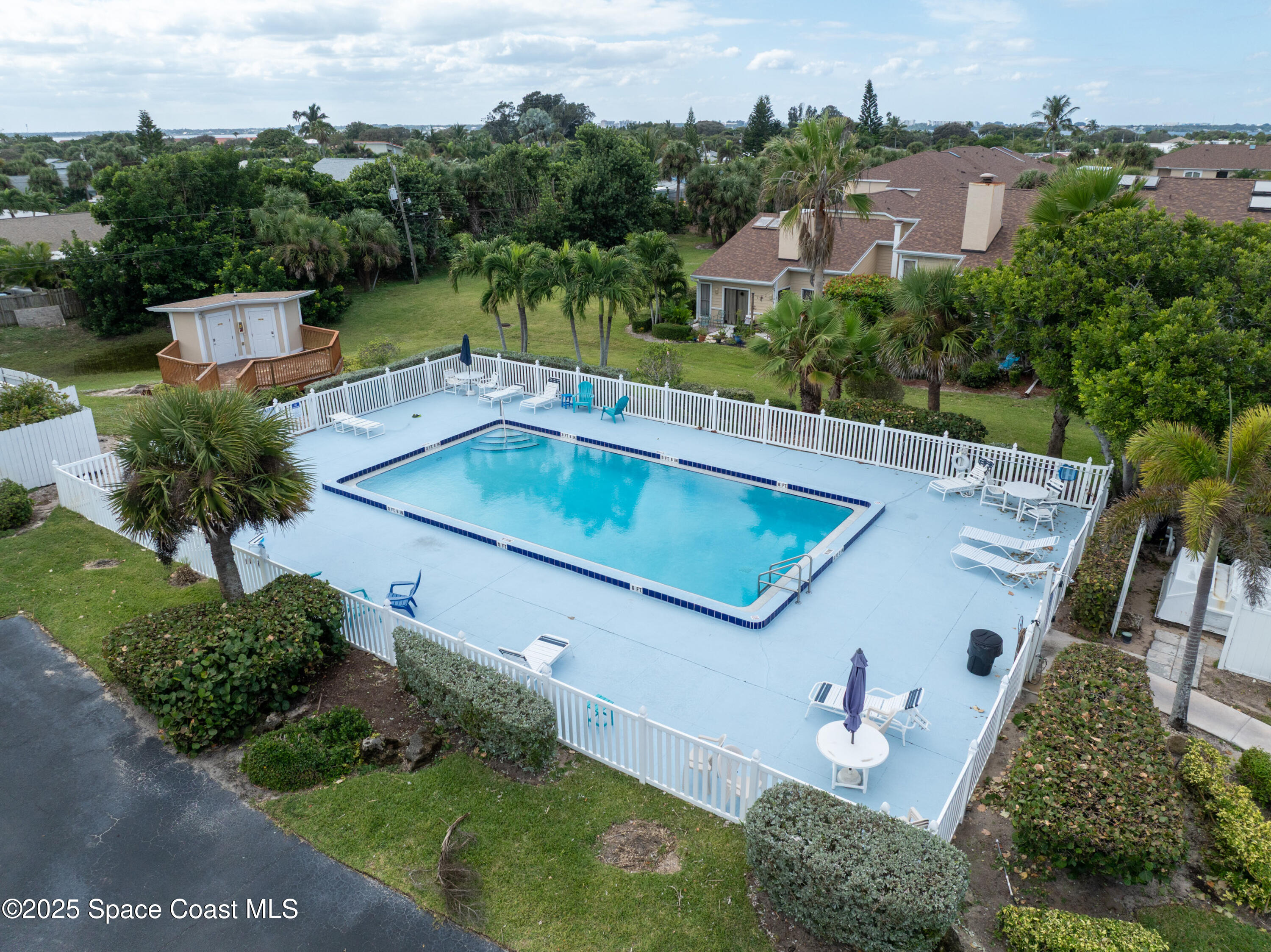 101 La Costa Street, Unit 6B Melbourne, FL 32951 - Photo 18 of 24 an aerial view of a house with outdoor space and lake view