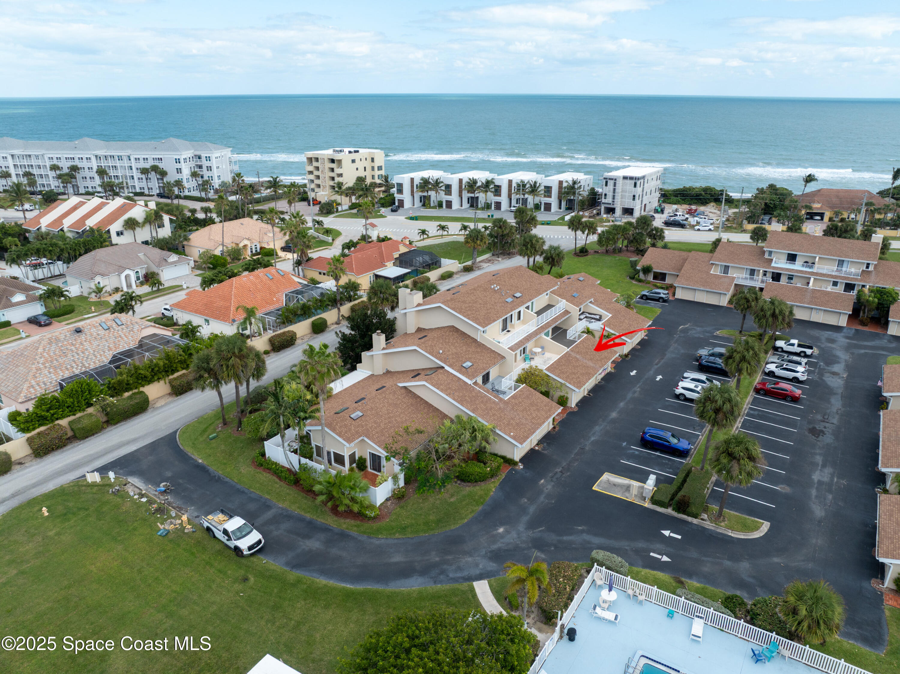 101 La Costa Street, Unit 6B Melbourne, FL 32951 - Photo 20 of 24 an aerial view of a house with a garden