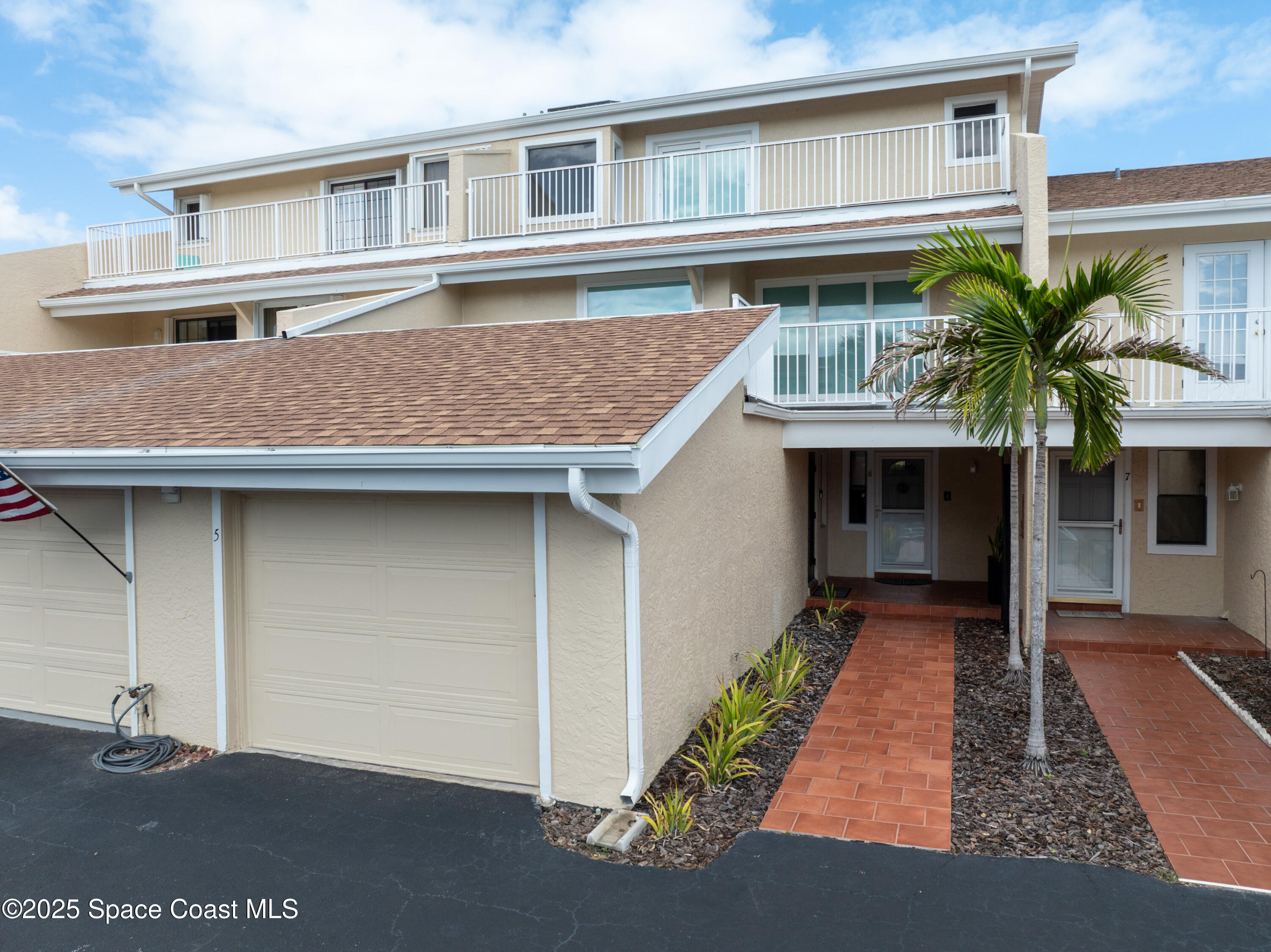 101 La Costa Street, Unit 6B Melbourne, FL 32951 - Photo 22 of 24 a house view with a outdoor space