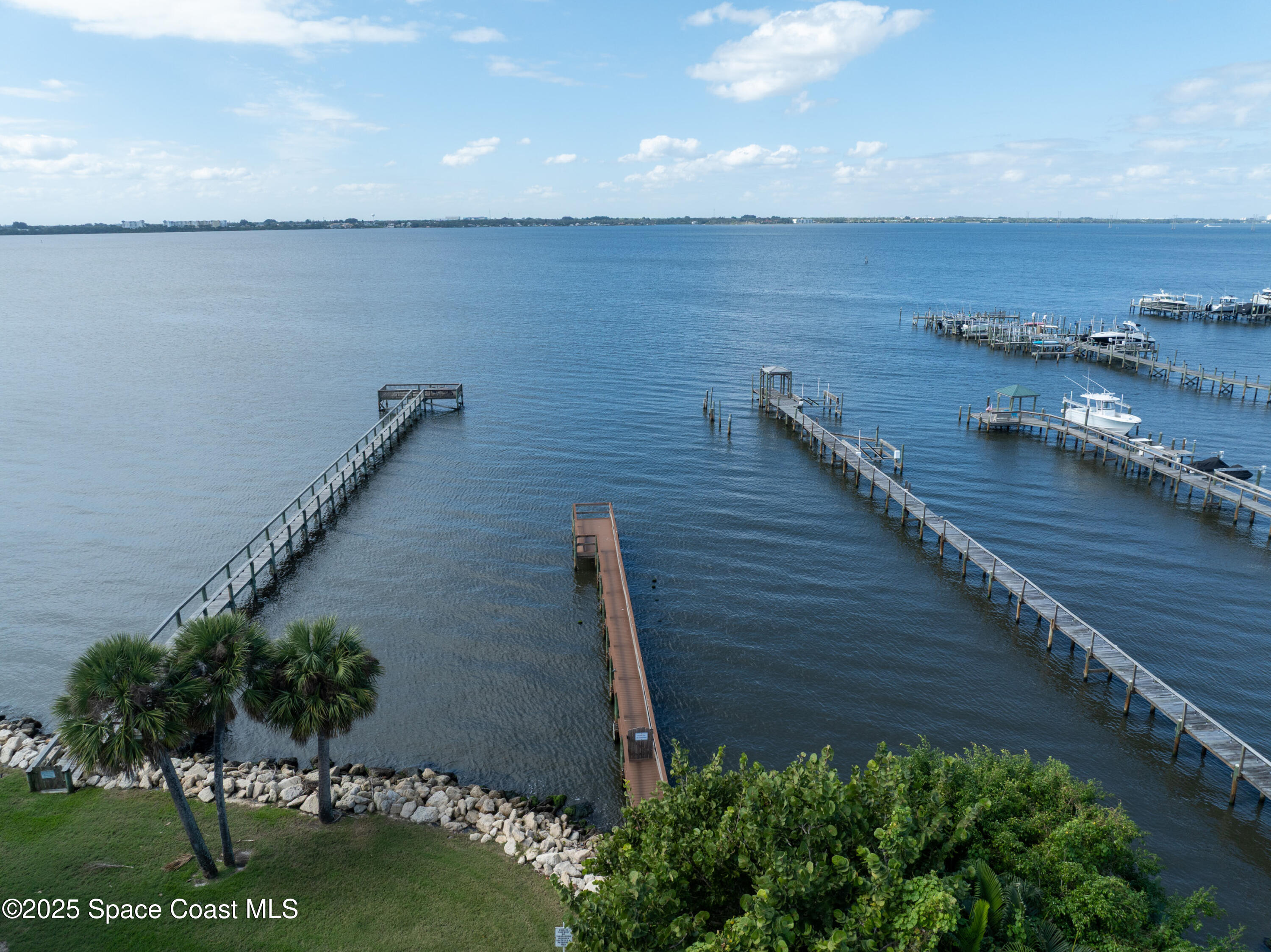101 La Costa Street, Unit 6B Melbourne, FL 32951 - Photo 23 of 24 a view of a terrace with a lake