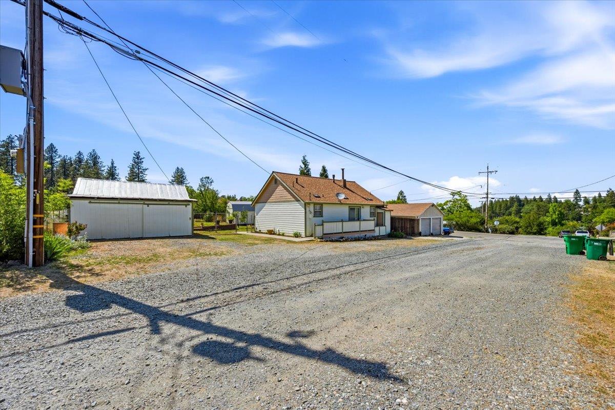 232 Upper Slate Creek Road Grass Valley, CA 95945 - Photo 45 of 48 a front view of a house with a yard