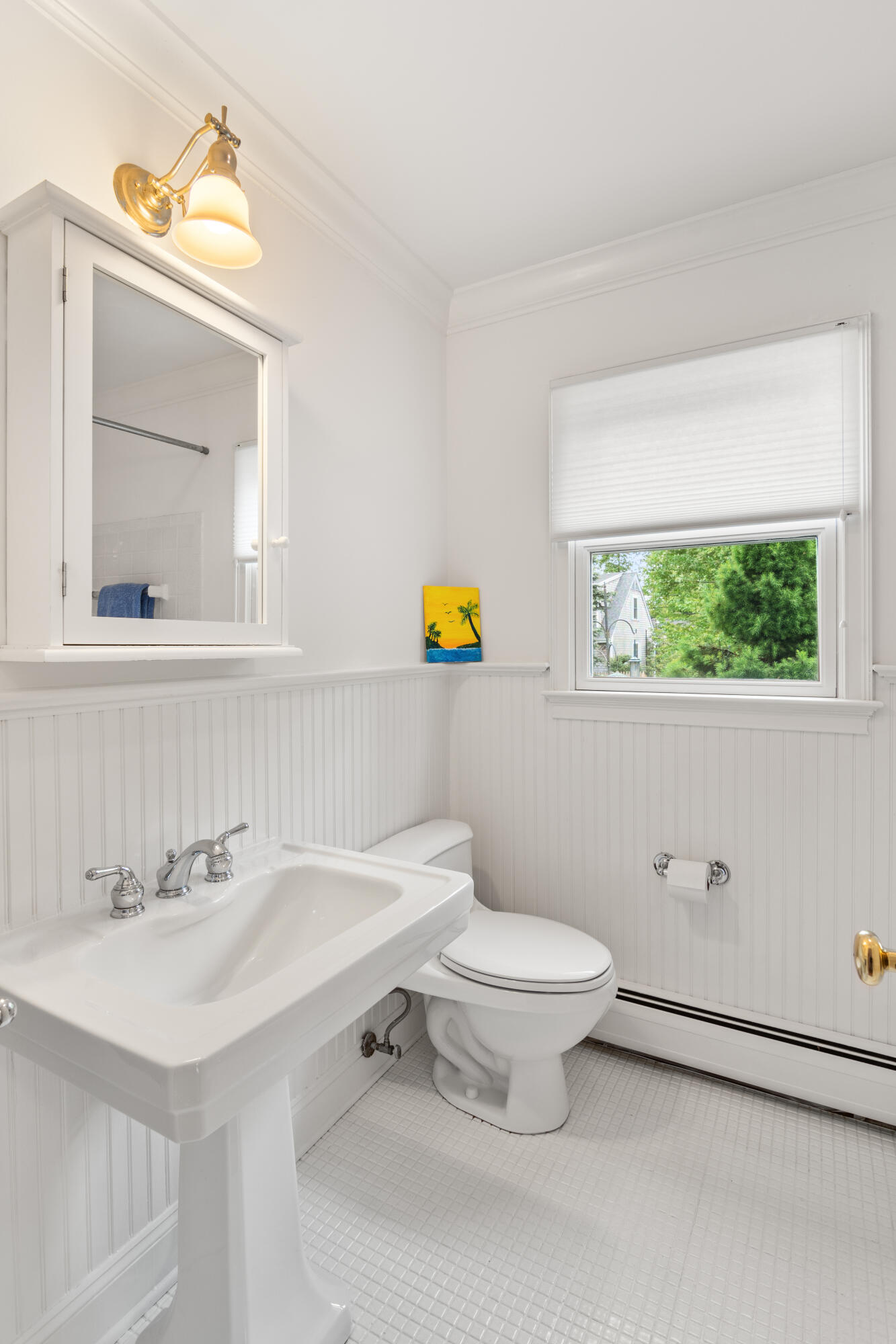 3 Old Field Road Rowayton, CT 06853 - Photo 14 of 29 a bathroom with a sink a toilet and a mirror