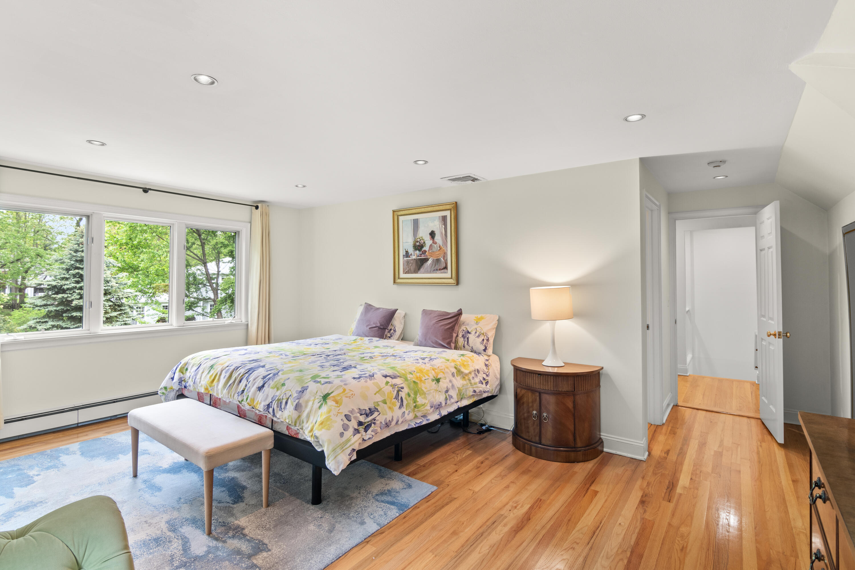 3 Old Field Road Rowayton, CT 06853 - Photo 15 of 29 a bedroom with a bed and wooden floor