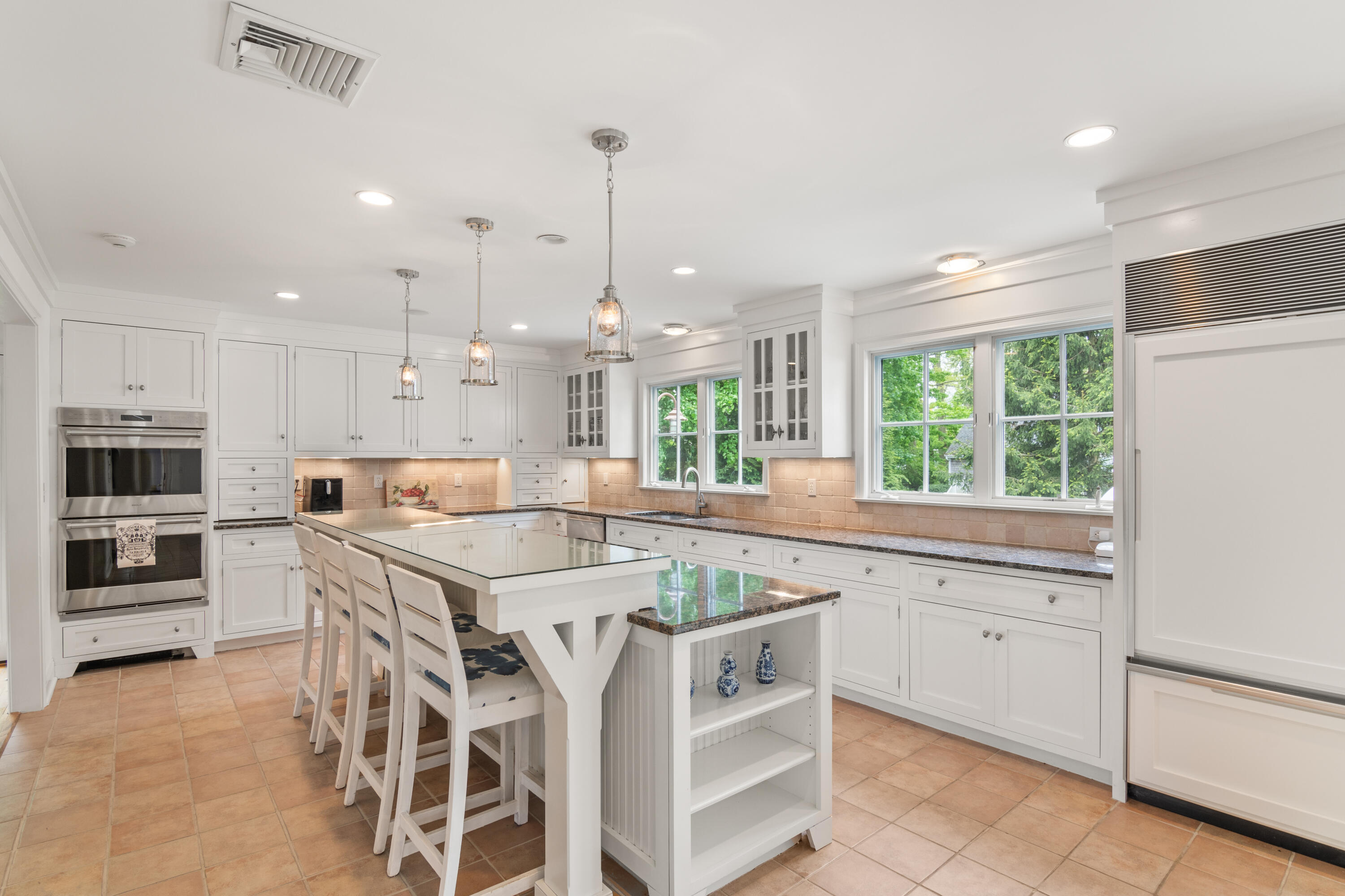 3 Old Field Road Rowayton, CT 06853 - Photo 6 of 29 a kitchen with a stove a sink and a refrigerator