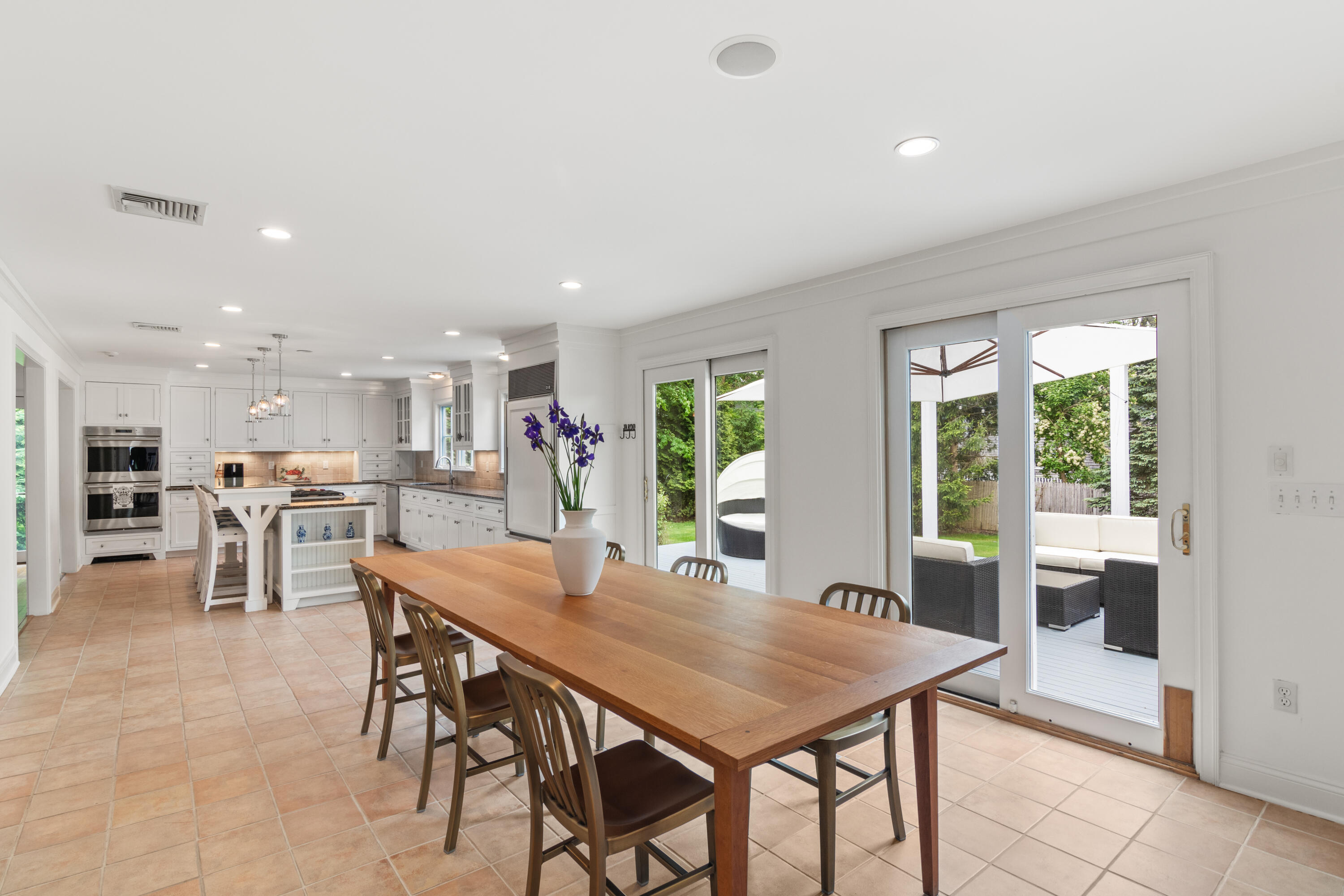 3 Old Field Road Rowayton, CT 06853 - Photo 10 of 29 a view of a dining room with furniture and a table