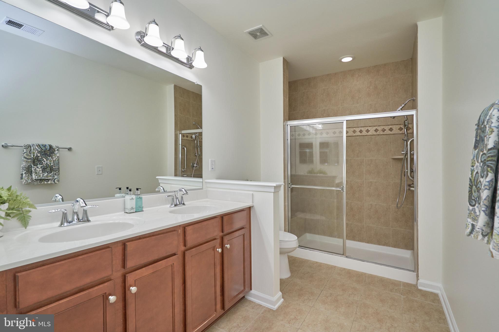 44315 Stableford Square Ashburn, VA 20147 - Photo 22 of 49 Primary Ensuite Bathroom wiith dual sinks vanity