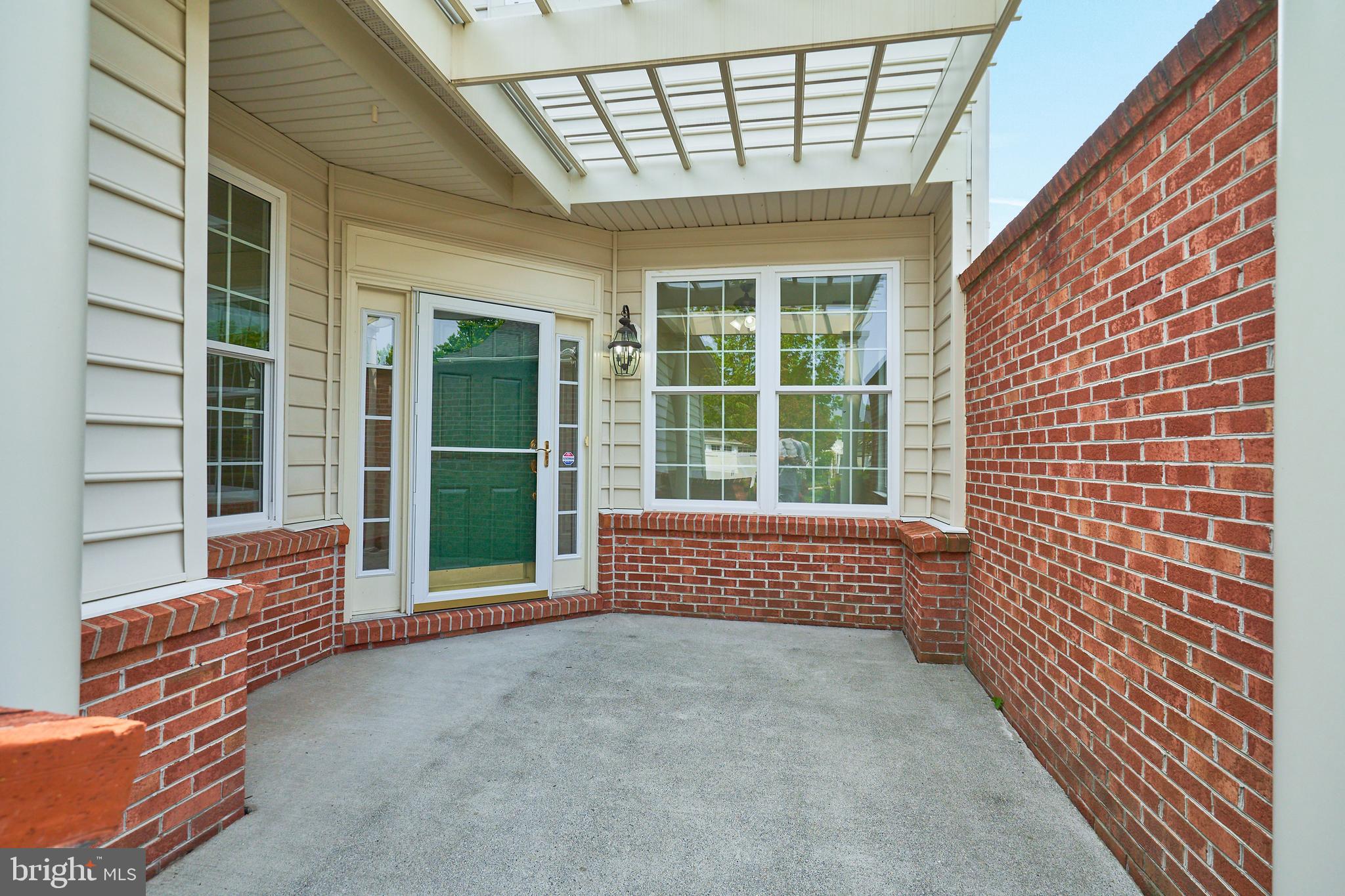 44315 Stableford Square Ashburn, VA 20147 - Photo 3 of 49 Welcoming Patio with portico