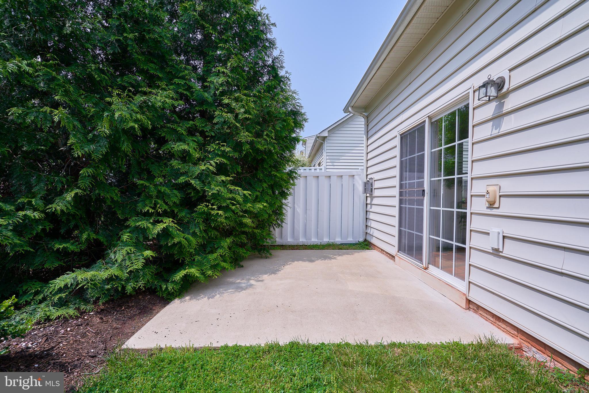 44315 Stableford Square Ashburn, VA 20147 - Photo 35 of 49 Sliding Glass Door to rear patio from Family Rm