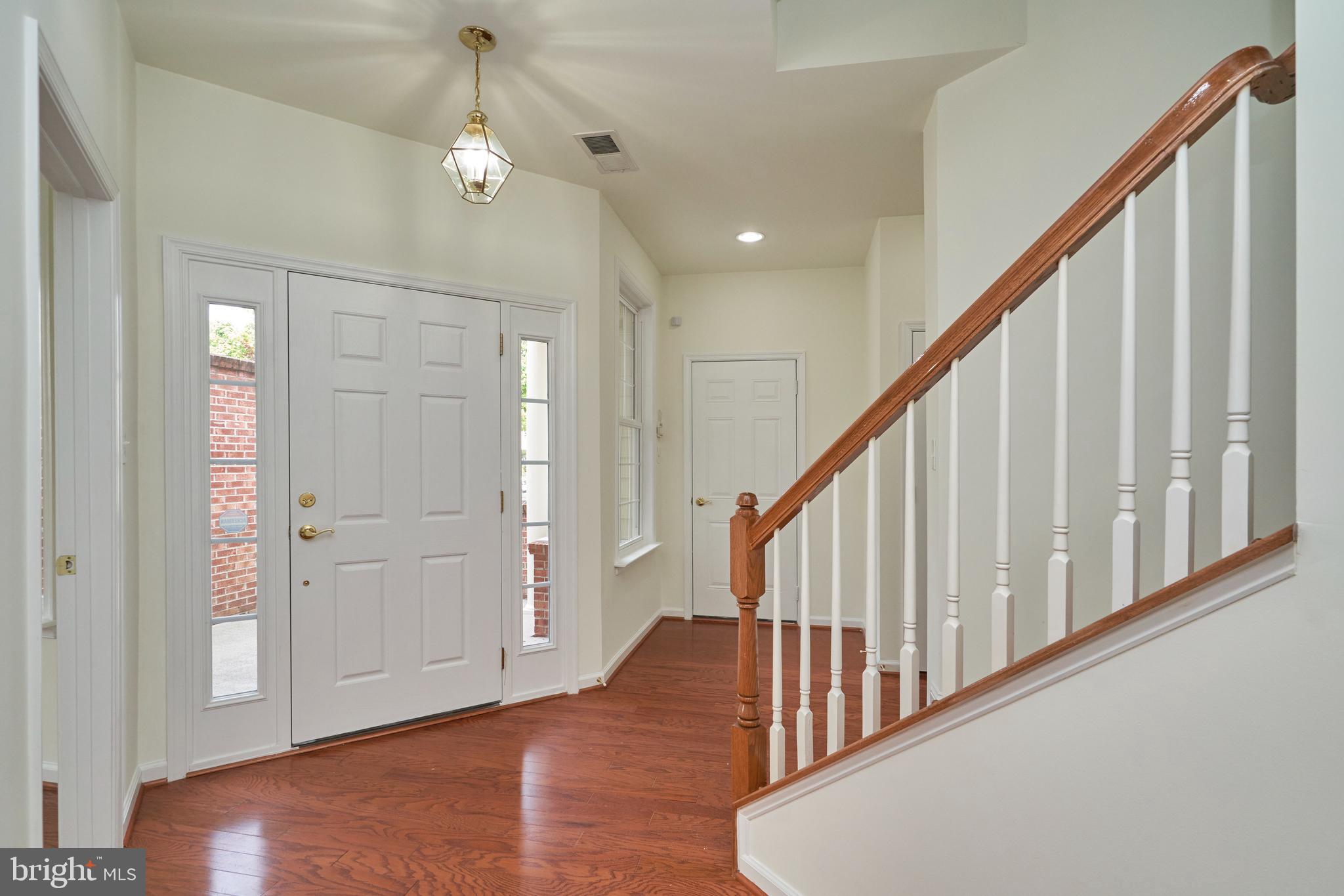 44315 Stableford Square Ashburn, VA 20147 - Photo 5 of 49 Foyer Entrance with gleaming wood floors
