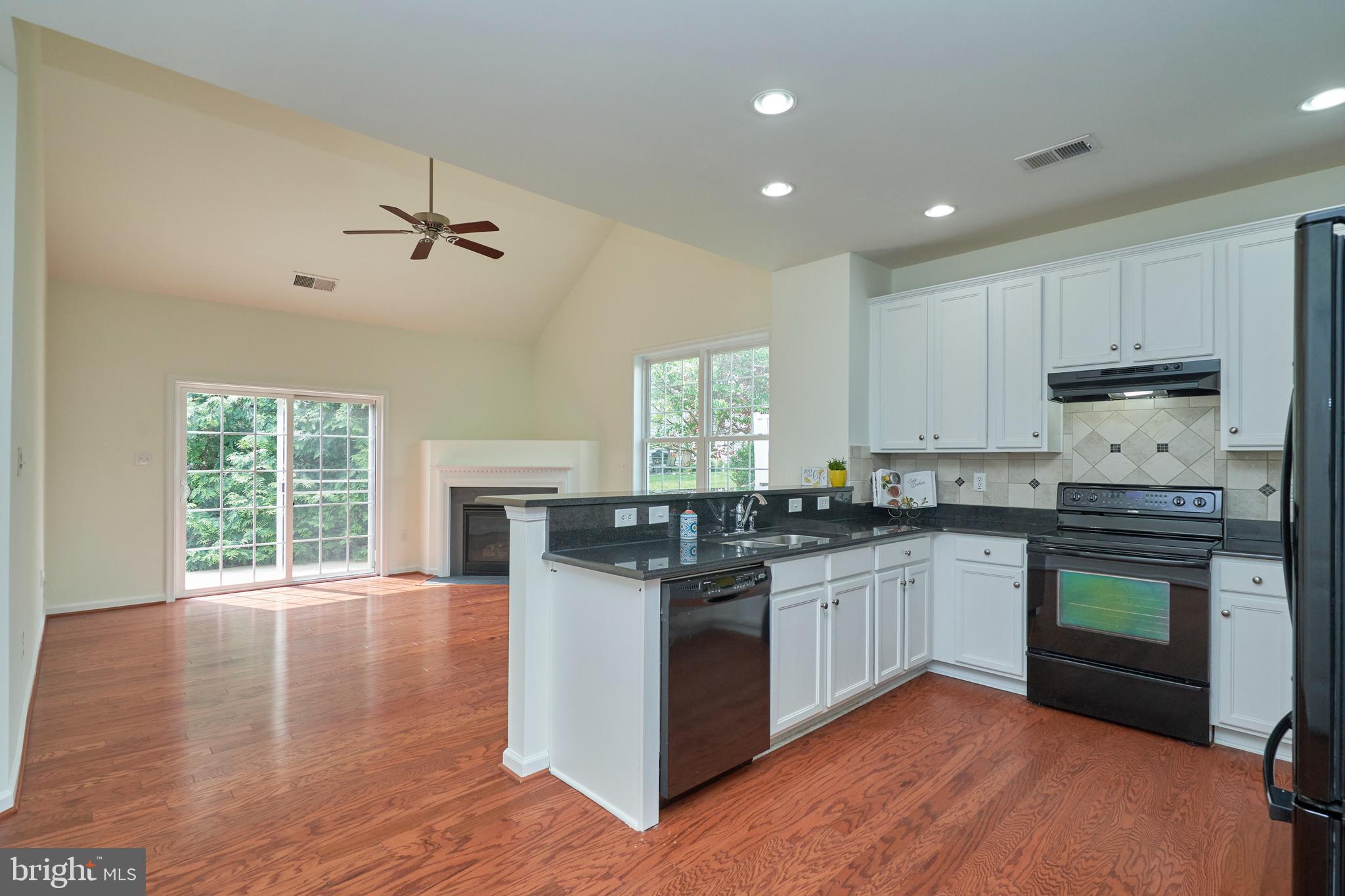 44315 Stableford Square Ashburn, VA 20147 - Photo 9 of 49 Kitchen opens to the family room