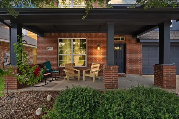 a view of outdoor space with chairs