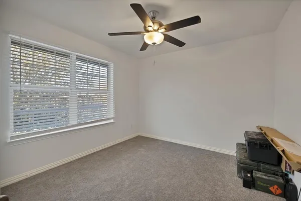 a en suite bathroom with a sink and a mirror