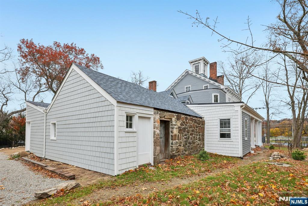 142 Island Road Mahwah, NJ 07430 - Photo 44 of 46 a view of a house with a yard