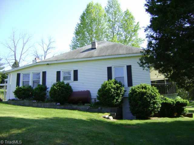 495 Reeves Mill Road Mount Airy, NC 27030 - Photo 5 of 9 Other. Left side of home with entrance to basement